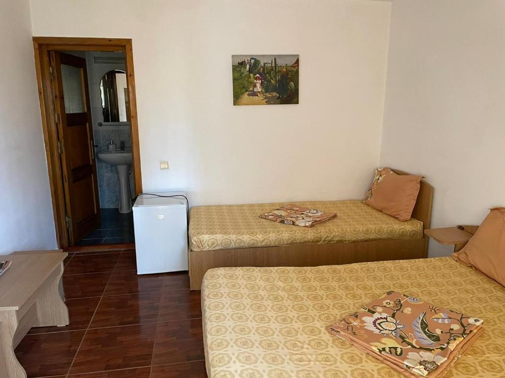 Ein Bett oder Betten in einem Zimmer der Unterkunft Vila Nadia