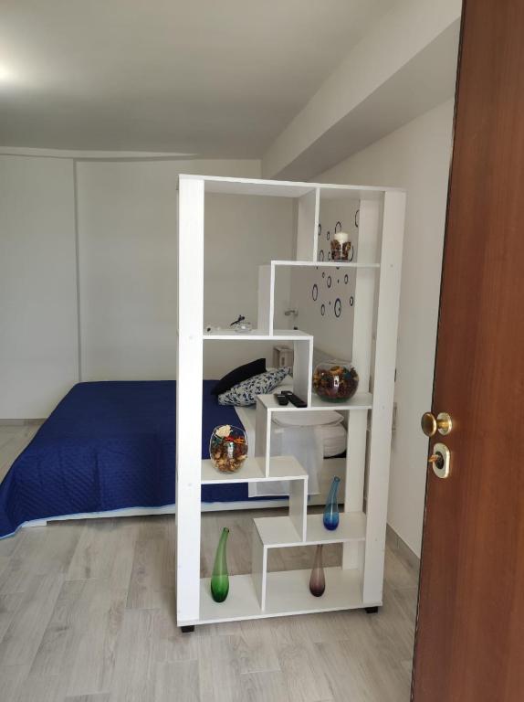Postel nebo postele na pokoji v ubytování CASE DI BACCO