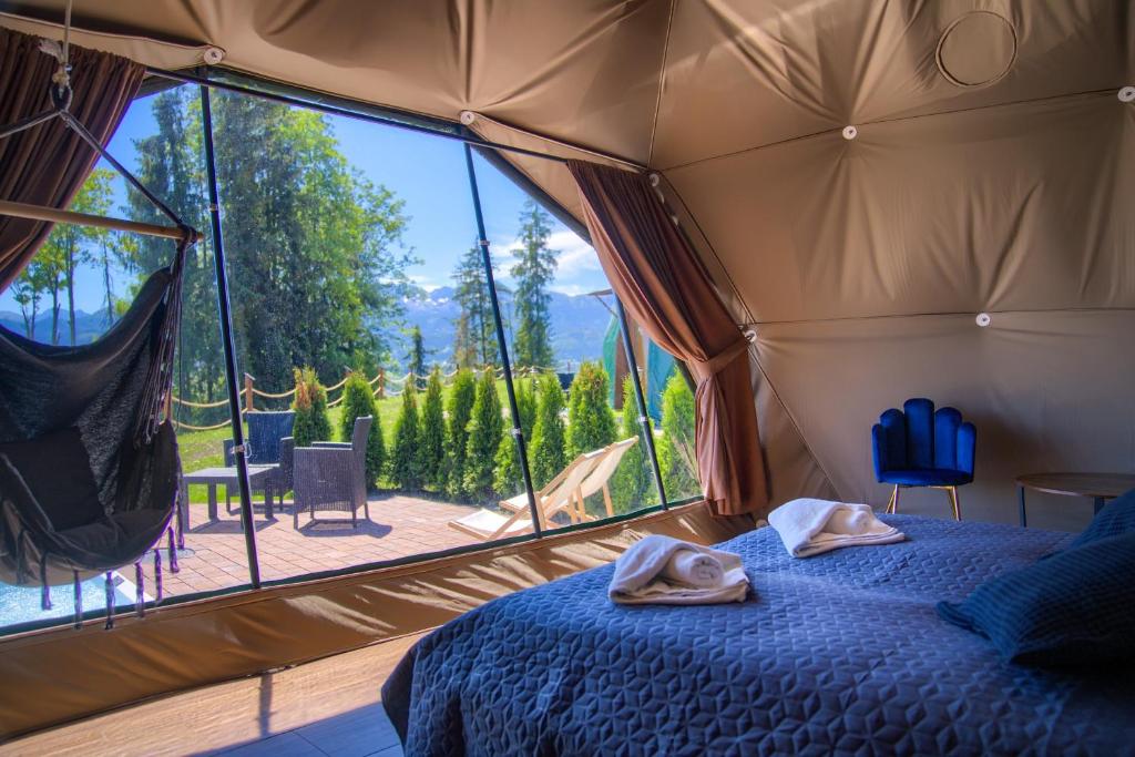 Posteľ alebo postele v izbe v ubytovaní Peak Glamp & Jacuzzi