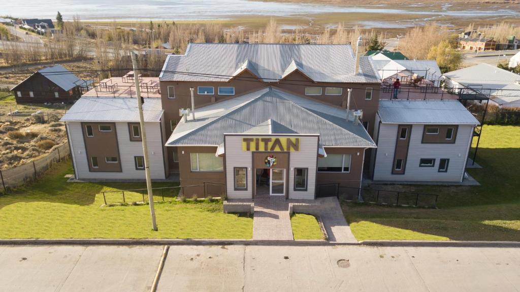 an overhead view of a house with a titan sign on it at Titan Hostel y Cabañas Del Titan in El Calafate