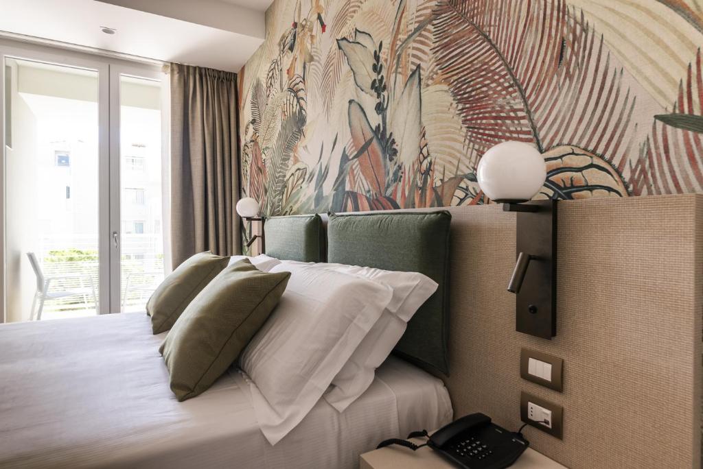 Кровать или кровати в номере Life Hotel