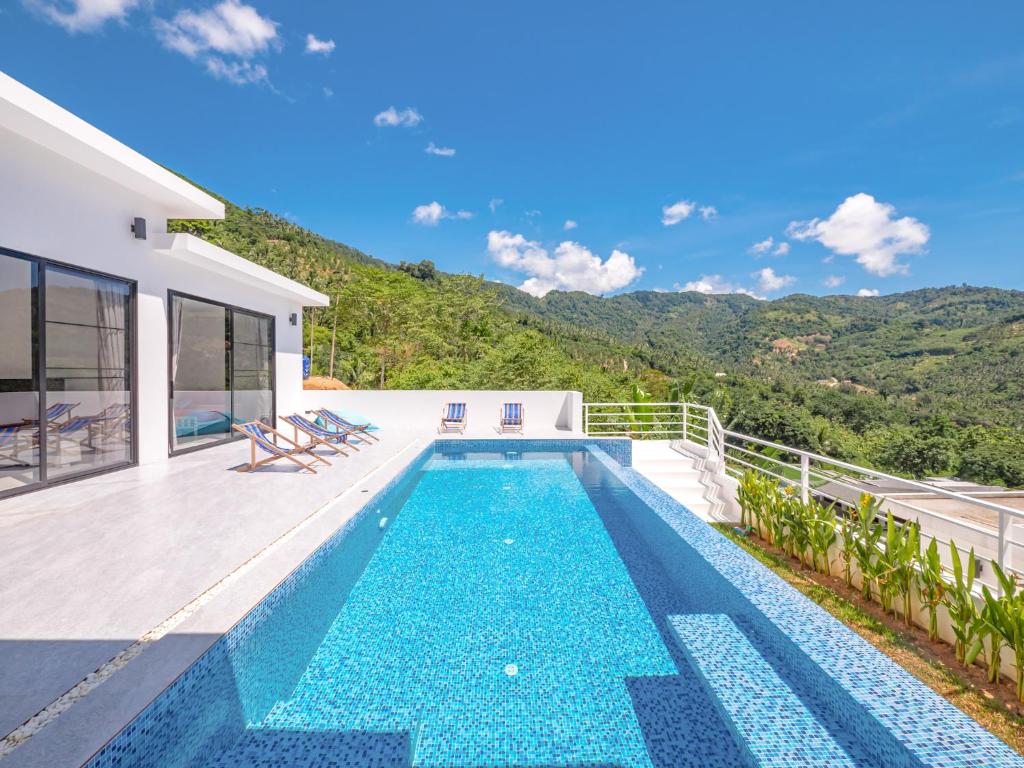 a villa with a swimming pool and a house at M&C Villa 2 bedrooms Lamai Amazing view in Lamai