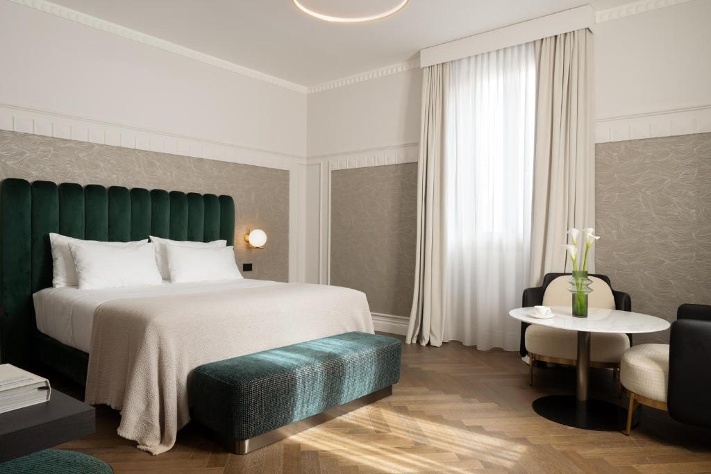 Postel nebo postele na pokoji v ubytování Patria Palace Lecce - The Leading Hotels of The World