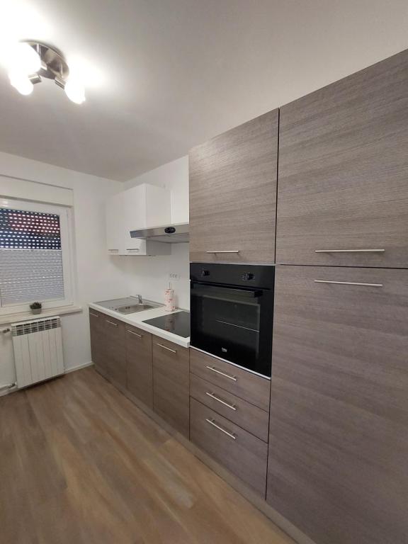 Kuchyň nebo kuchyňský kout v ubytování Apartments Marica