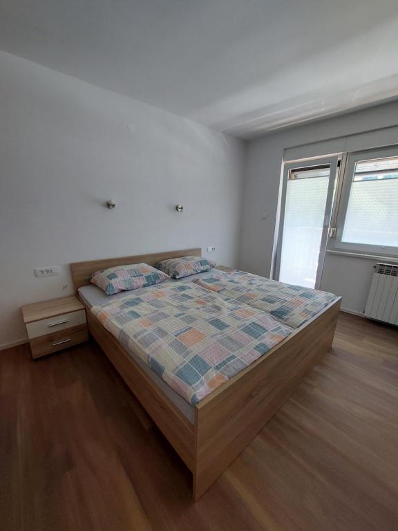 Postel nebo postele na pokoji v ubytování Apartments Marica