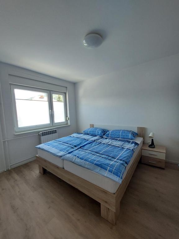 Postel nebo postele na pokoji v ubytování Apartments Marica