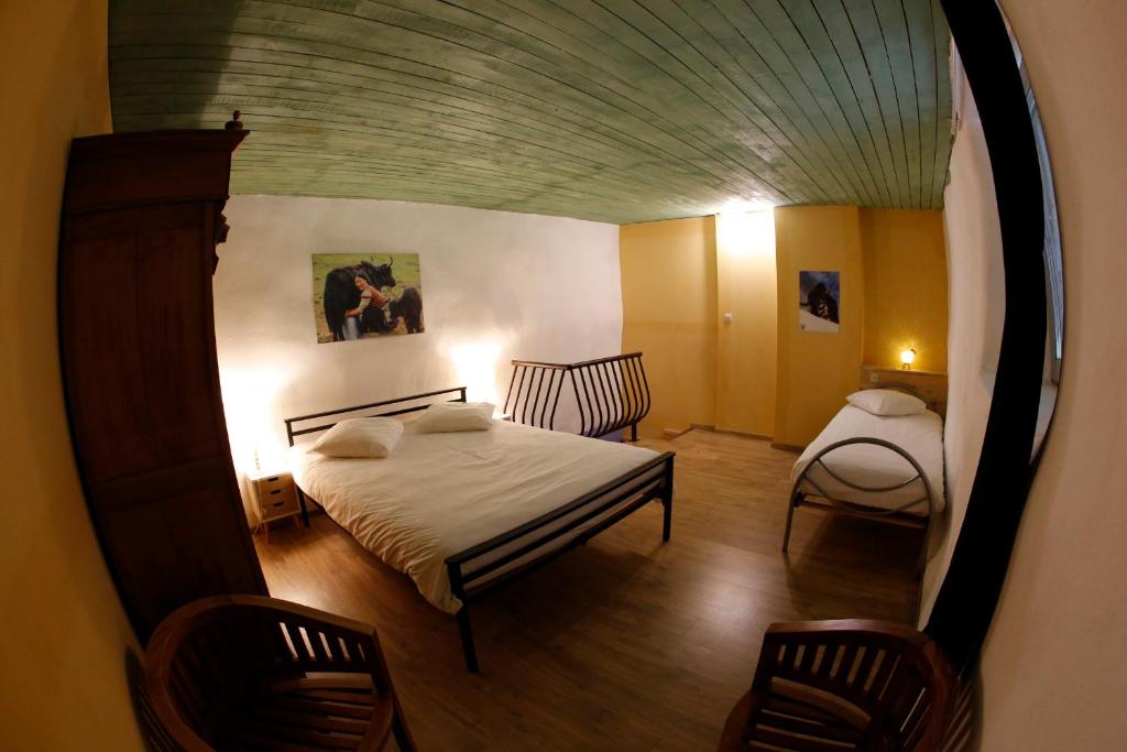 Postel nebo postele na pokoji v ubytování La Ligule