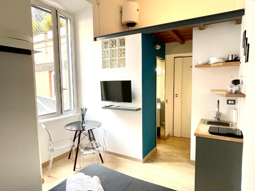 Kuchyňa alebo kuchynka v ubytovaní JEF Apartments Fontana di Trevi Loft, Roma