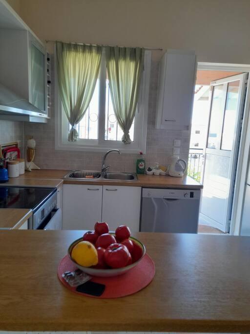 A kitchen or kitchenette at Derveni Summer House