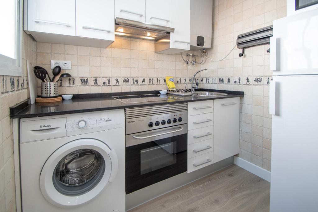 Kuchyňa alebo kuchynka v ubytovaní Apartamento Ooh La Lá Cádiz