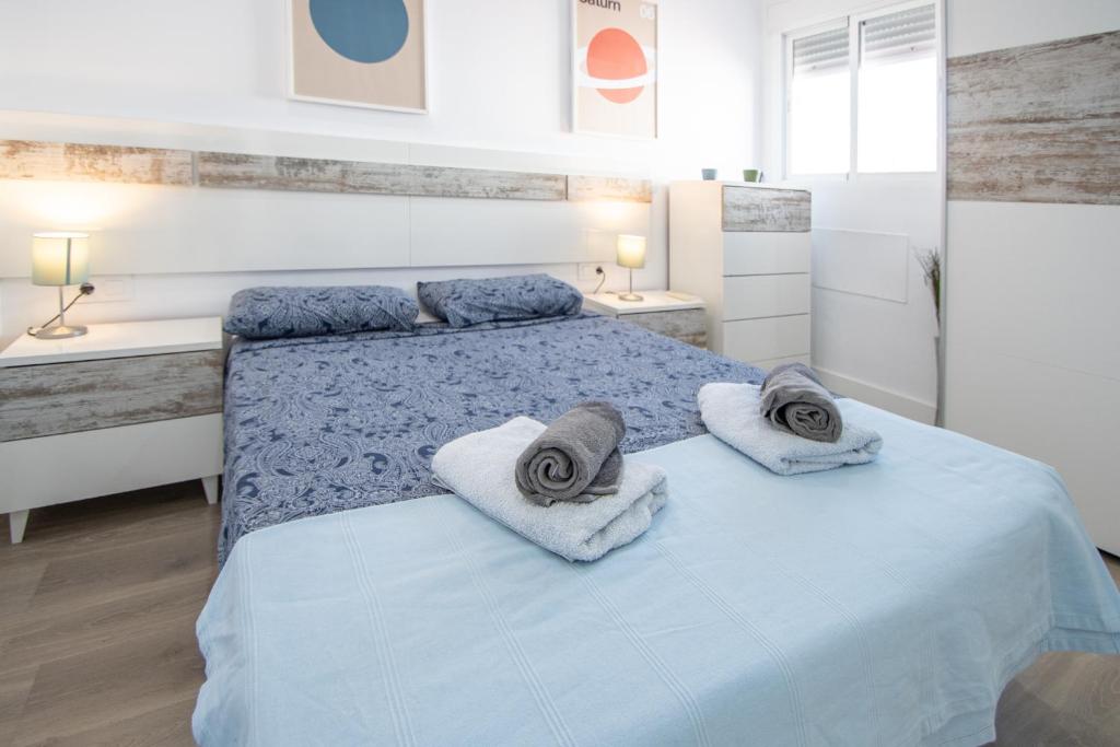 Posteľ alebo postele v izbe v ubytovaní Apartamento Ooh La Lá Cádiz