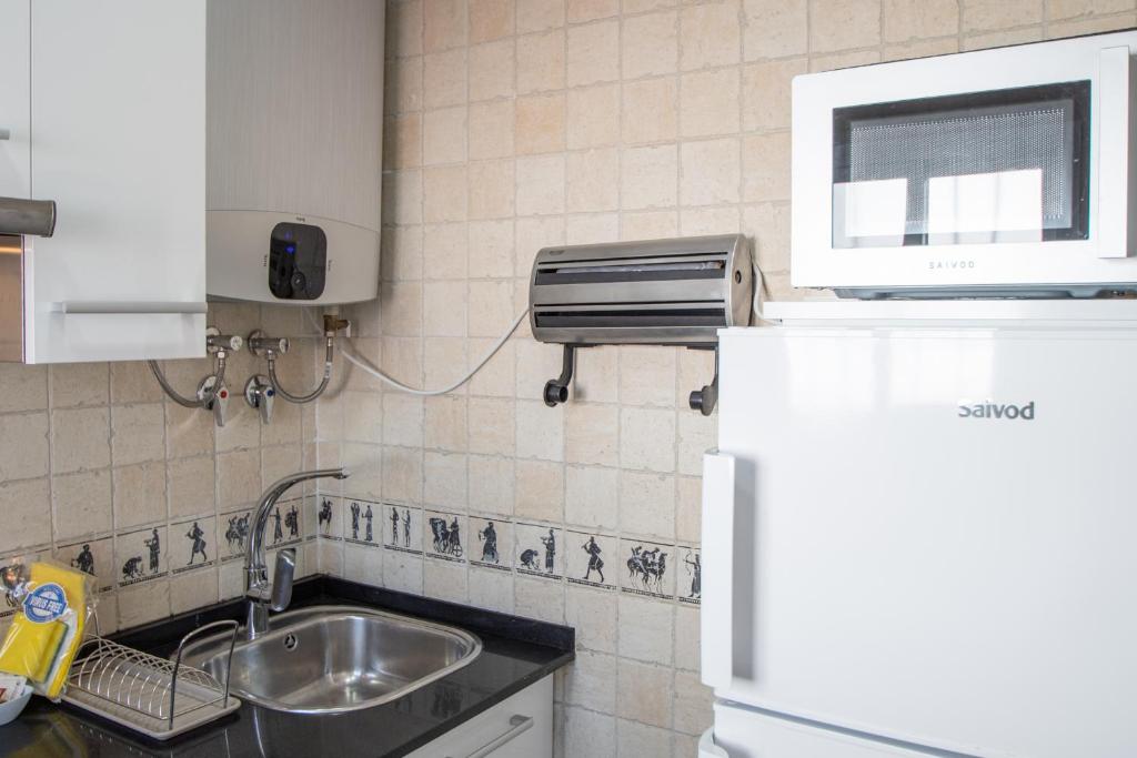 Kuchyňa alebo kuchynka v ubytovaní Apartamento Ooh La Lá Cádiz