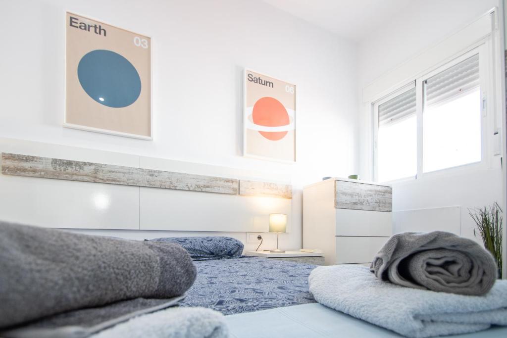 Posteľ alebo postele v izbe v ubytovaní Apartamento Ooh La Lá Cádiz