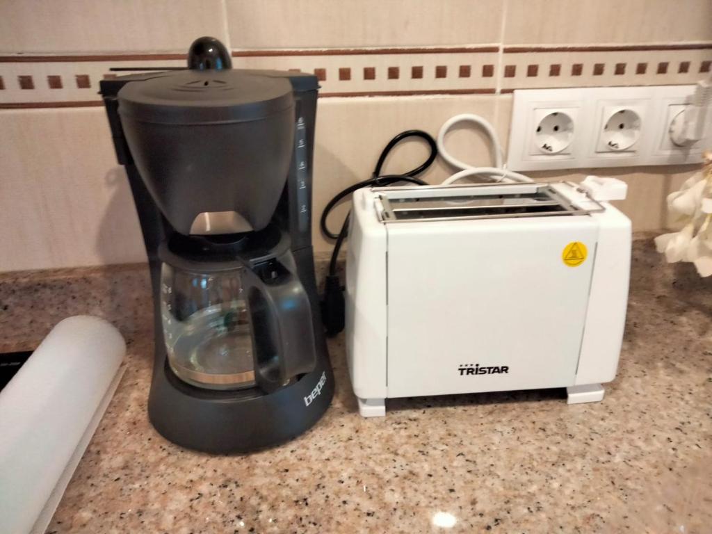 Coffee and tea making facilities at Confort y Relax