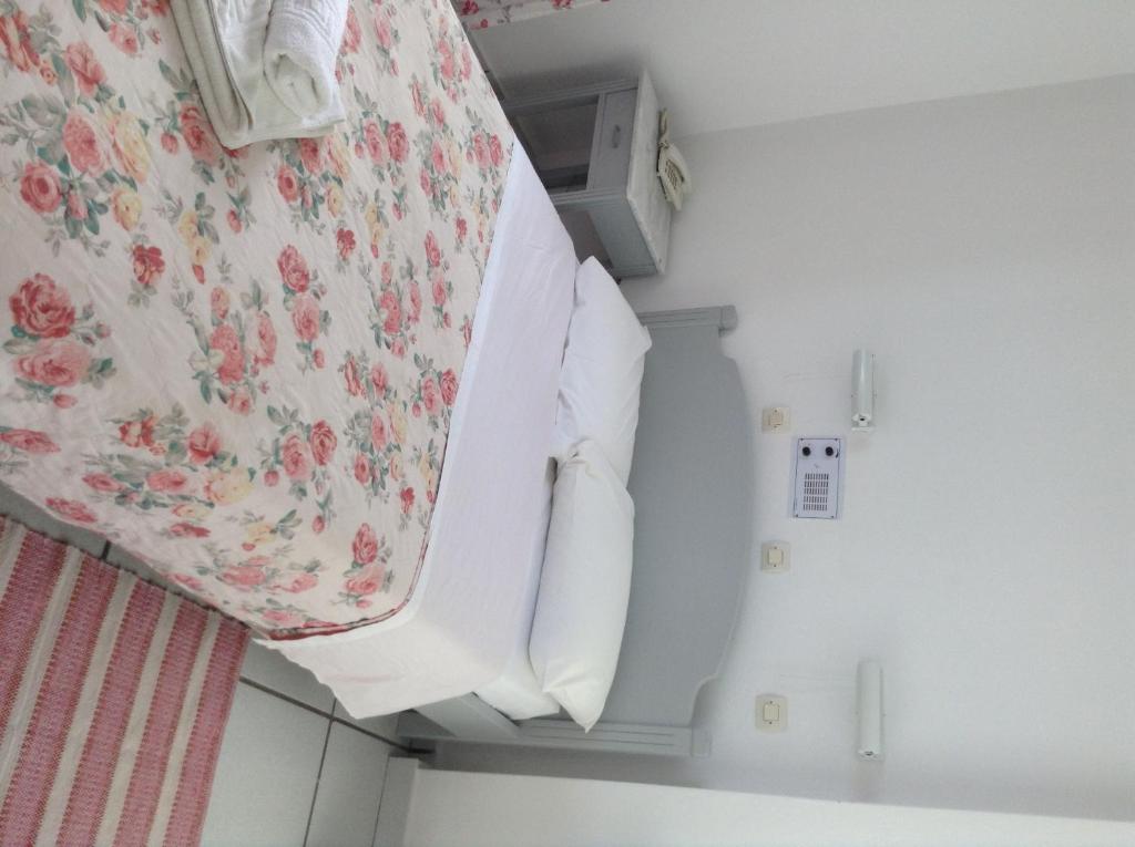 Postel nebo postele na pokoji v ubytování King Thiras Hotel