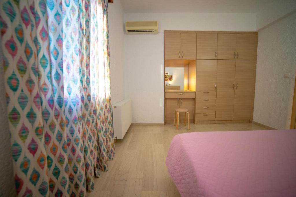 Postel nebo postele na pokoji v ubytování Bay View Apts II