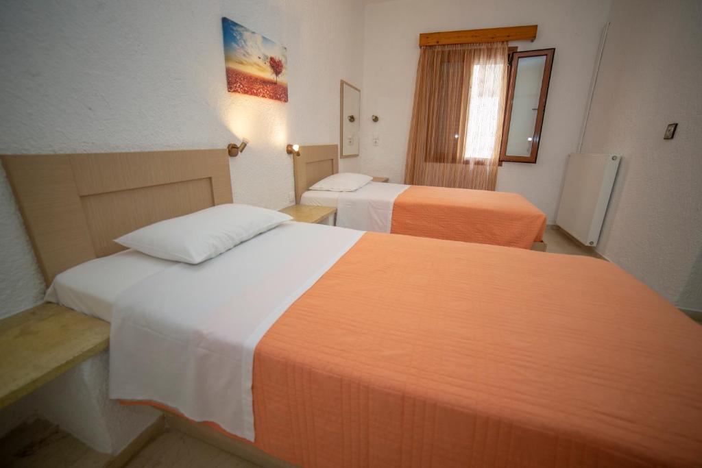 Postel nebo postele na pokoji v ubytování Bay View Apts II