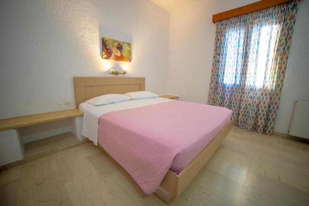 Postel nebo postele na pokoji v ubytování Bay View Apts II
