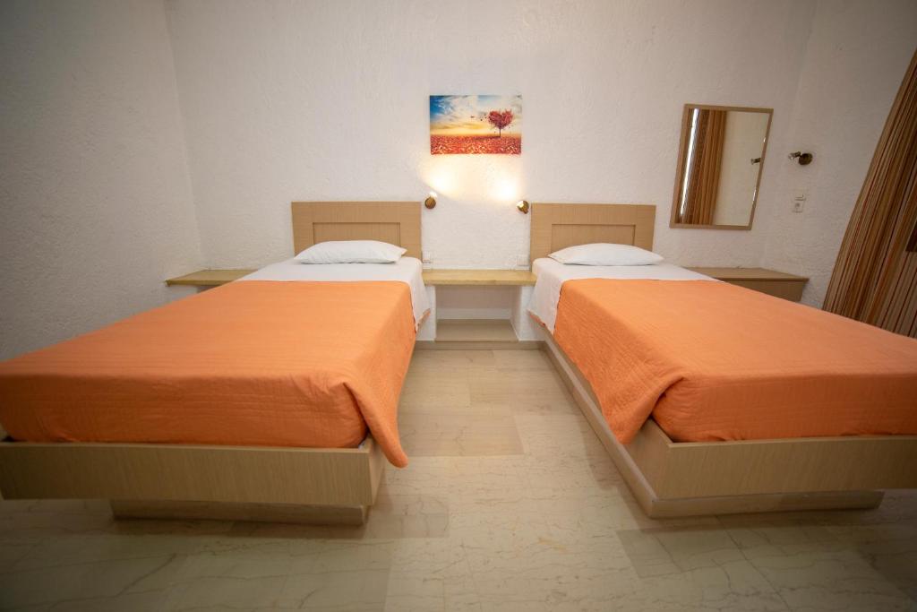 Postel nebo postele na pokoji v ubytování Bay View Apts II
