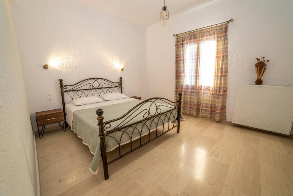 Postel nebo postele na pokoji v ubytování Bay View Apts II
