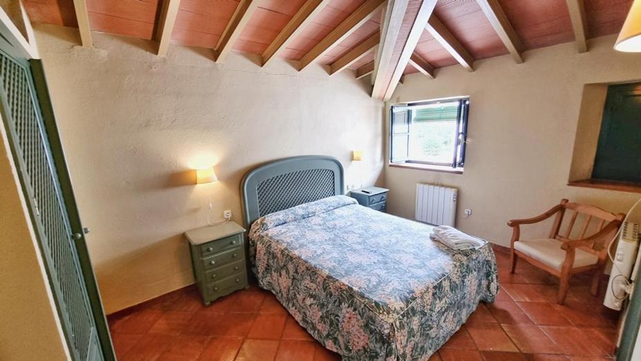 Cama o camas de una habitación en Casa Tinoco Casa Rural Categoria Superior