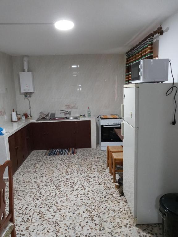 Kuchyň nebo kuchyňský kout v ubytování Casa Maria