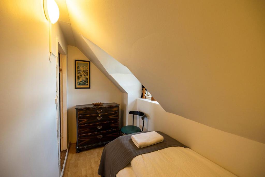 Ένα ή περισσότερα κρεβάτια σε δωμάτιο στο Heidi Guesthouse