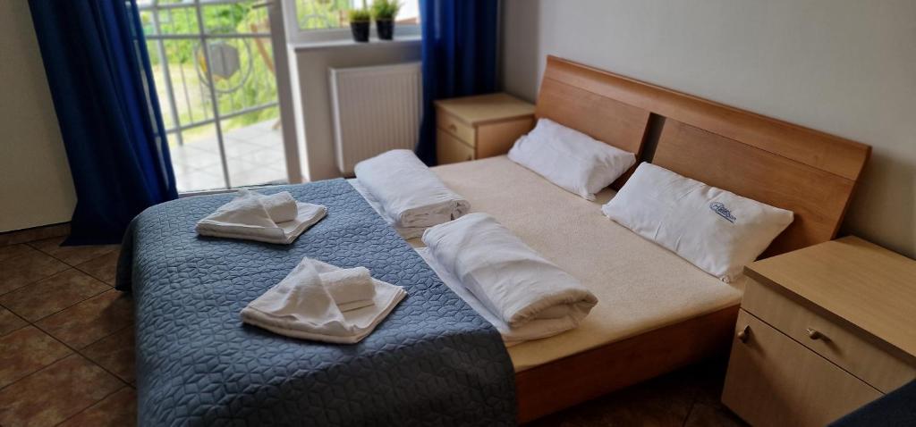Posteľ alebo postele v izbe v ubytovaní Apartament Hexagon nr 21