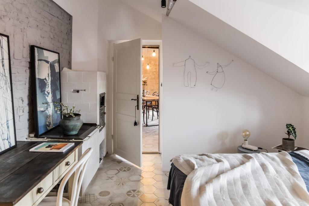 Postel nebo postele na pokoji v ubytování Kupola 32 Apartment