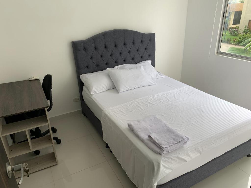 Postel nebo postele na pokoji v ubytování Mango Home
