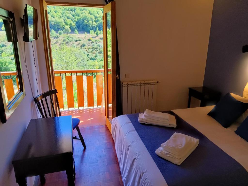 Postel nebo postele na pokoji v ubytování Quinta de Leandres