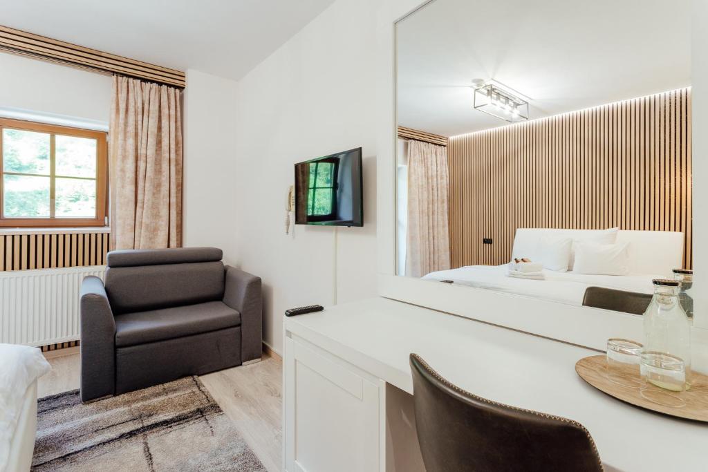 TV a/nebo společenská místnost v ubytování Hotel Marlene