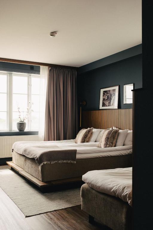 Postel nebo postele na pokoji v ubytování Hotel Strana