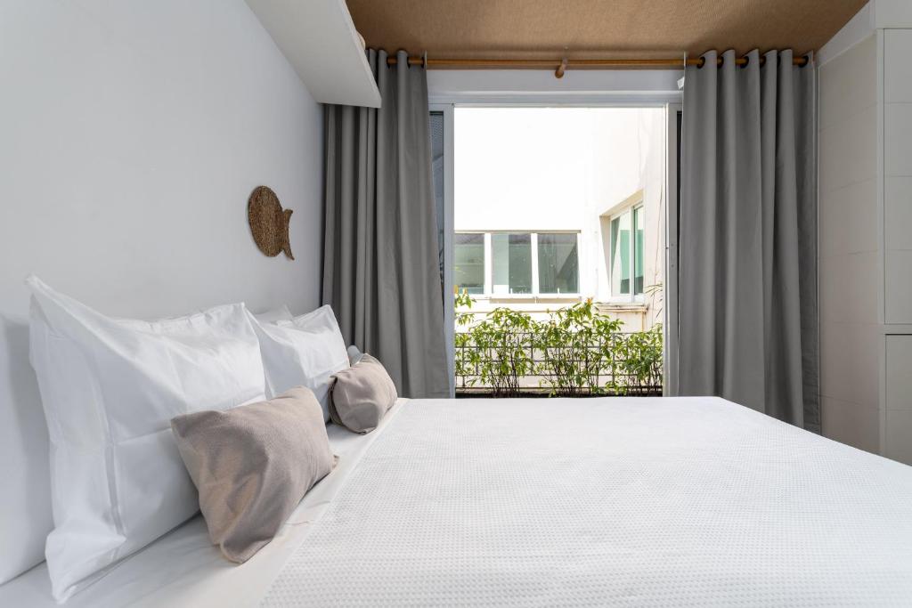 Кровать или кровати в номере Cobertura em Ipanema - Vista oceânica - JAC1
