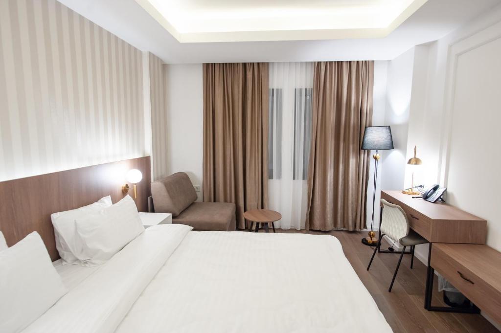 Postel nebo postele na pokoji v ubytování Hotel Freya