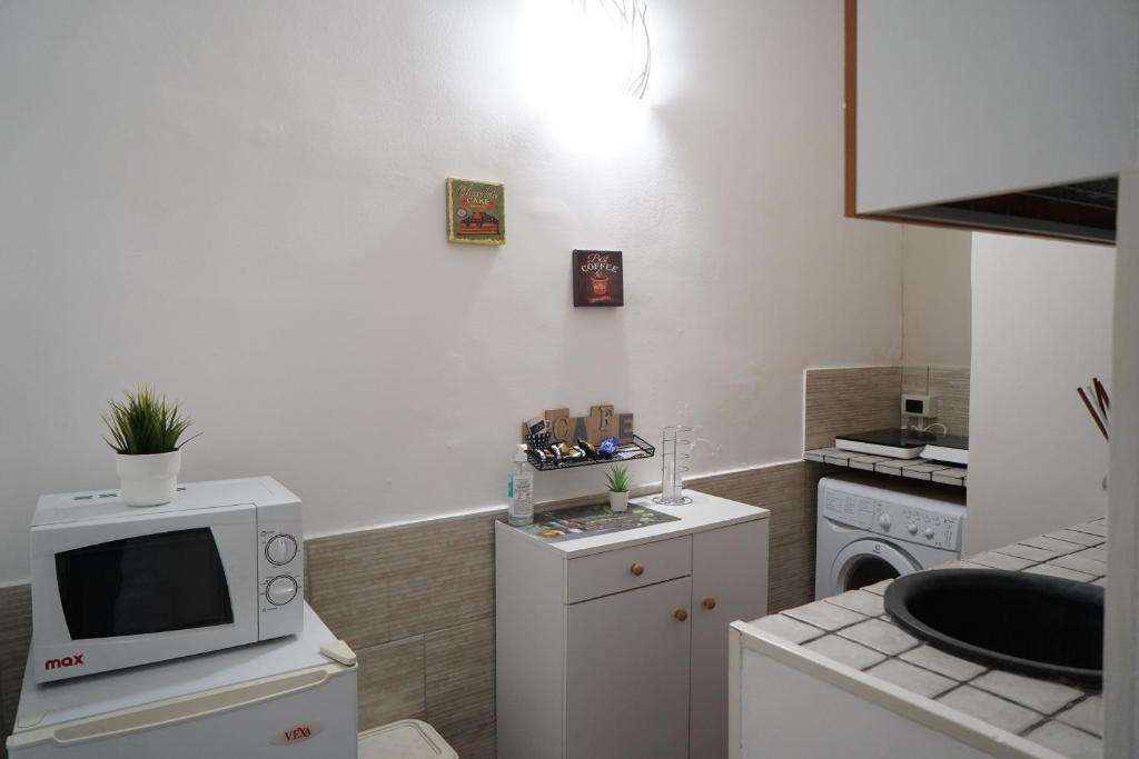 Kuchnia lub aneks kuchenny w obiekcie Magrì Apartments Catania
