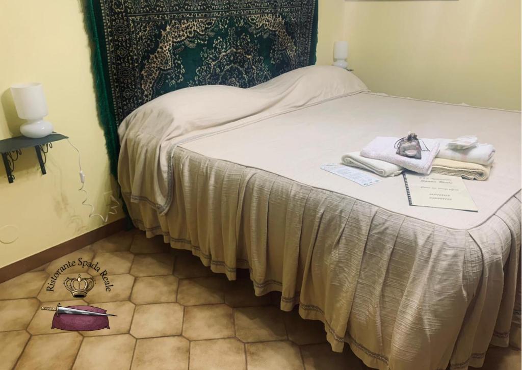 Postel nebo postele na pokoji v ubytování Spada Reale