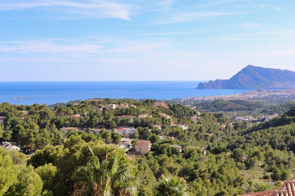 an aerial view of the ocean and a city at Large chalet with private pool in Altea