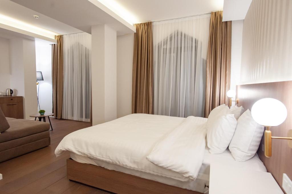 Postel nebo postele na pokoji v ubytování Hotel Freya