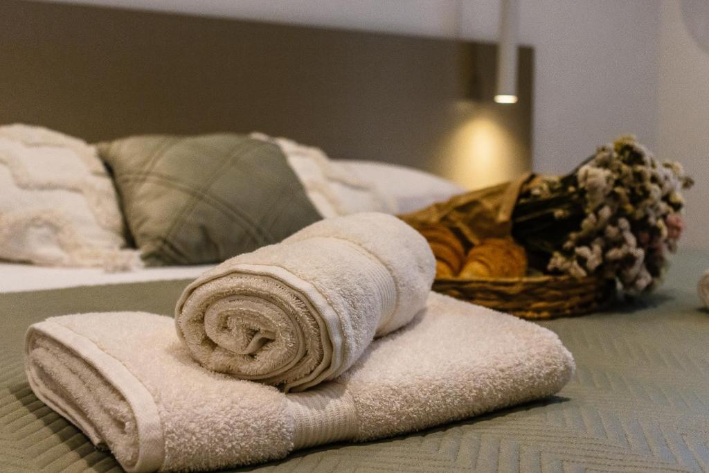 Postel nebo postele na pokoji v ubytování Apartments KIWI