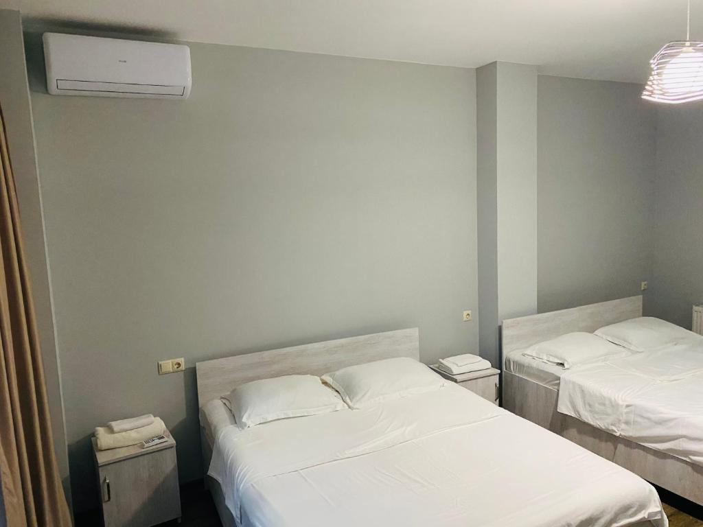 Postel nebo postele na pokoji v ubytování Kobuleti 728