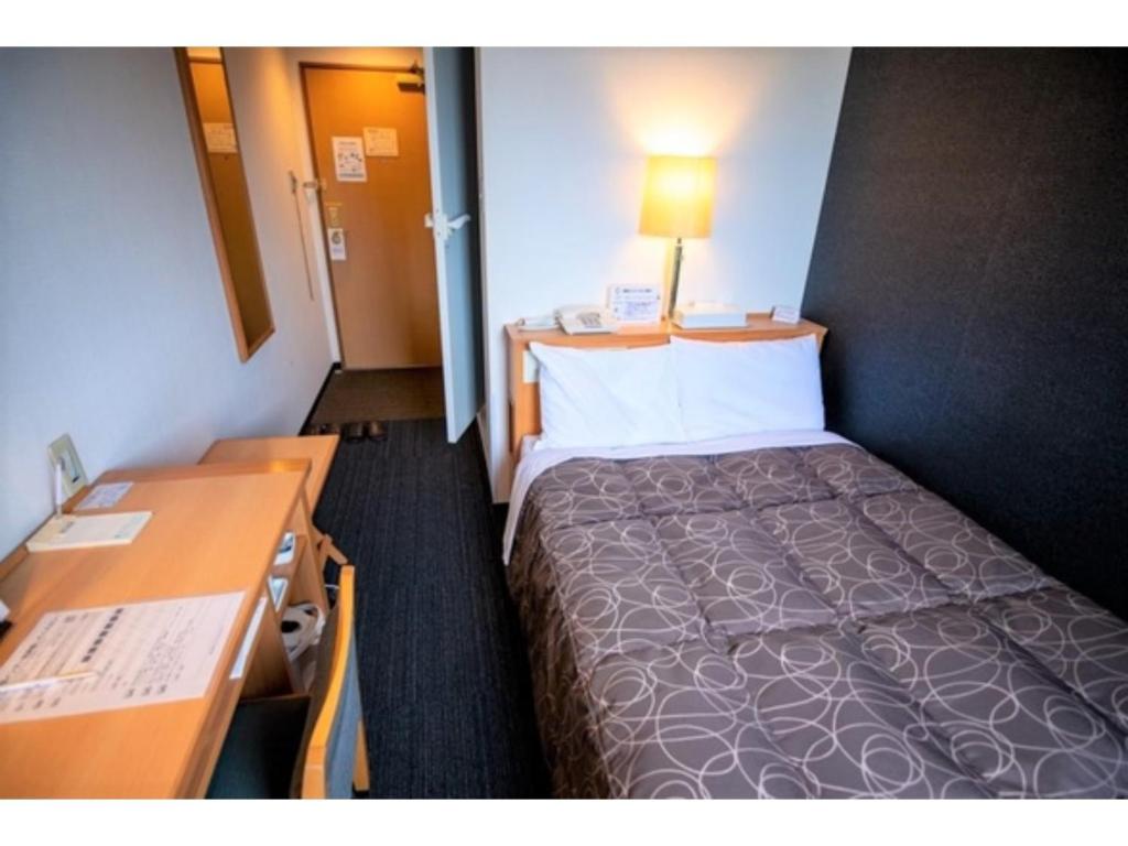 Кровать или кровати в номере AZ INN HANDA INTER - Vacation STAY 69375v
