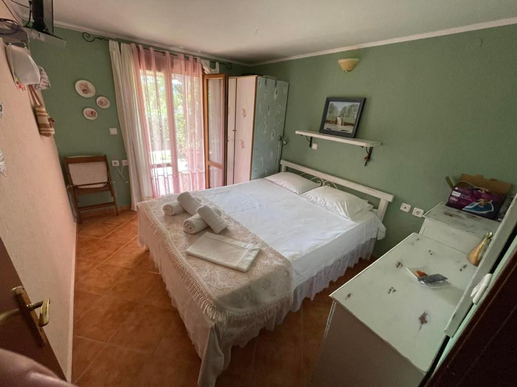Postel nebo postele na pokoji v ubytování DORA'S HOUSE