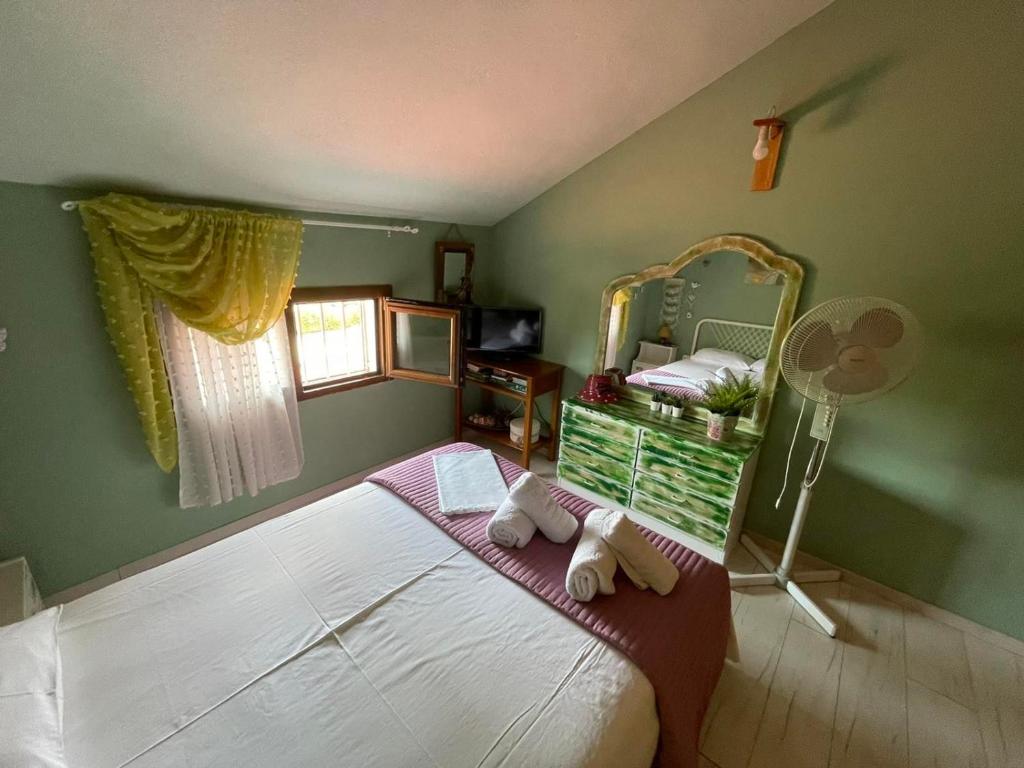 Postel nebo postele na pokoji v ubytování DORA'S HOUSE