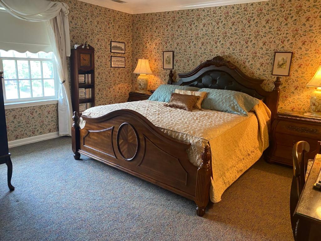 a bedroom with a large bed in a room at The Cypress Inn in Conway