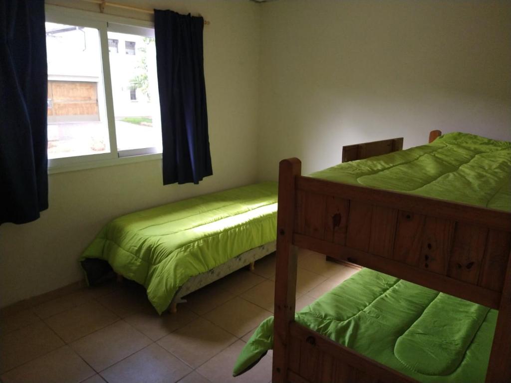 Tempat tidur dalam kamar di Casa La Comarca