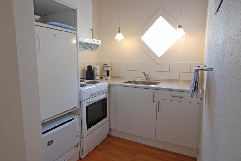 Kuchyň nebo kuchyňský kout v ubytování Skagen Apartment