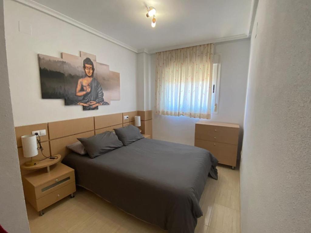Posteľ alebo postele v izbe v ubytovaní APARTAMENTO ZONA MARINADOR, CERCA A LA PLAYA