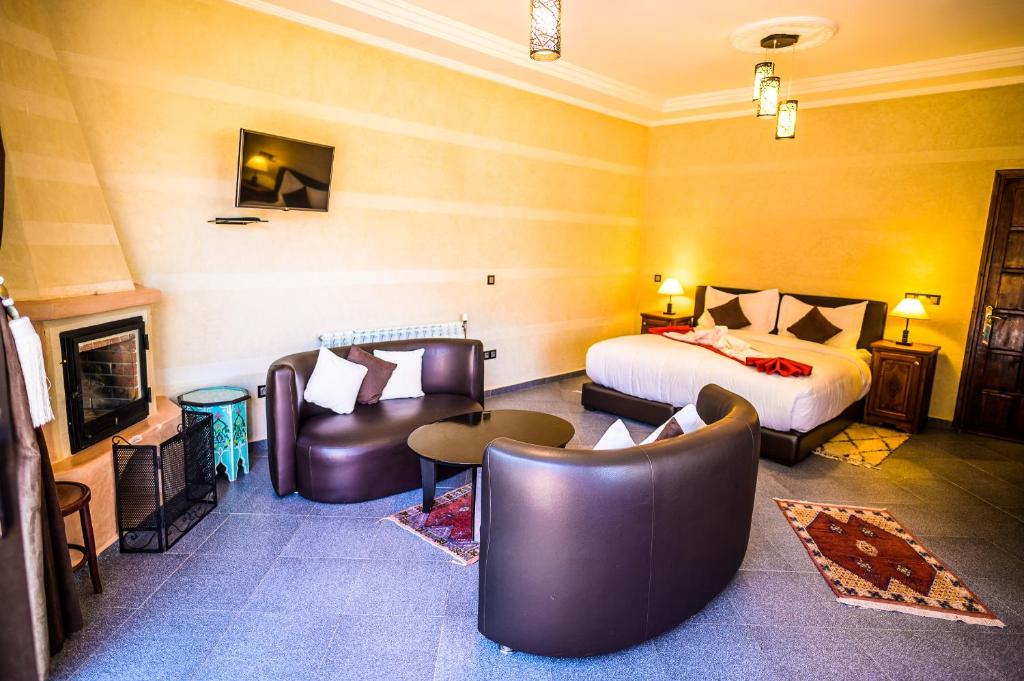 Postel nebo postele na pokoji v ubytování Aurocher Marrakech Ourika Oukaimeden
