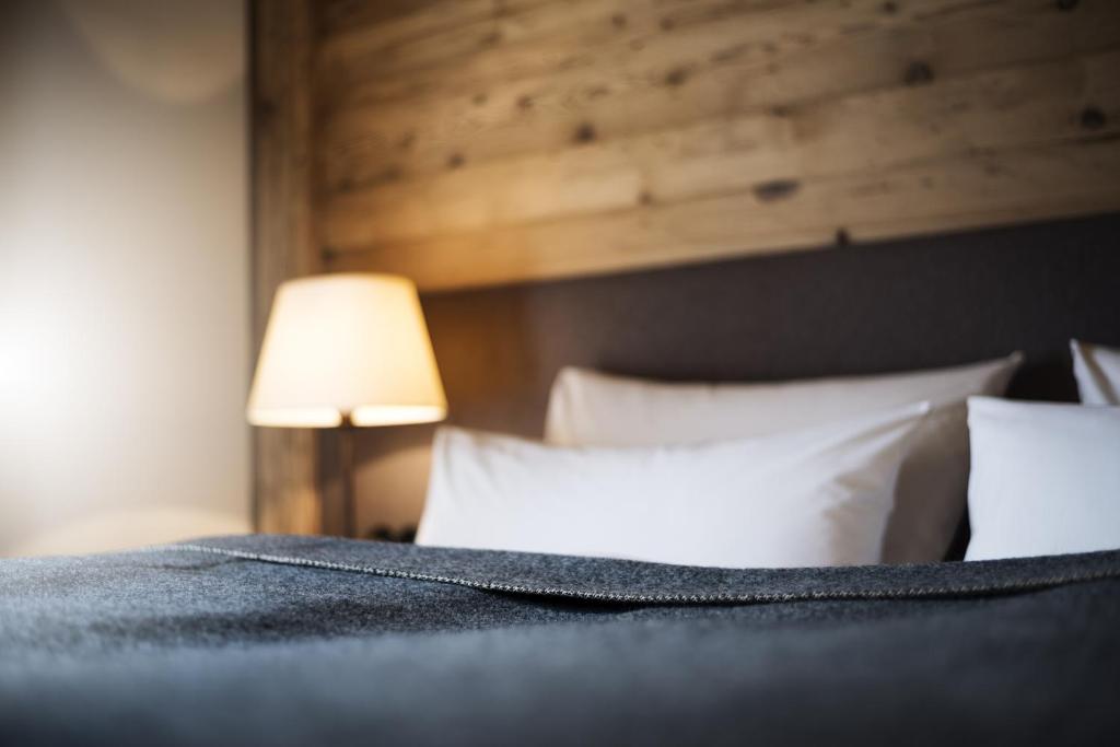 Posteľ alebo postele v izbe v ubytovaní Galzig Lodge